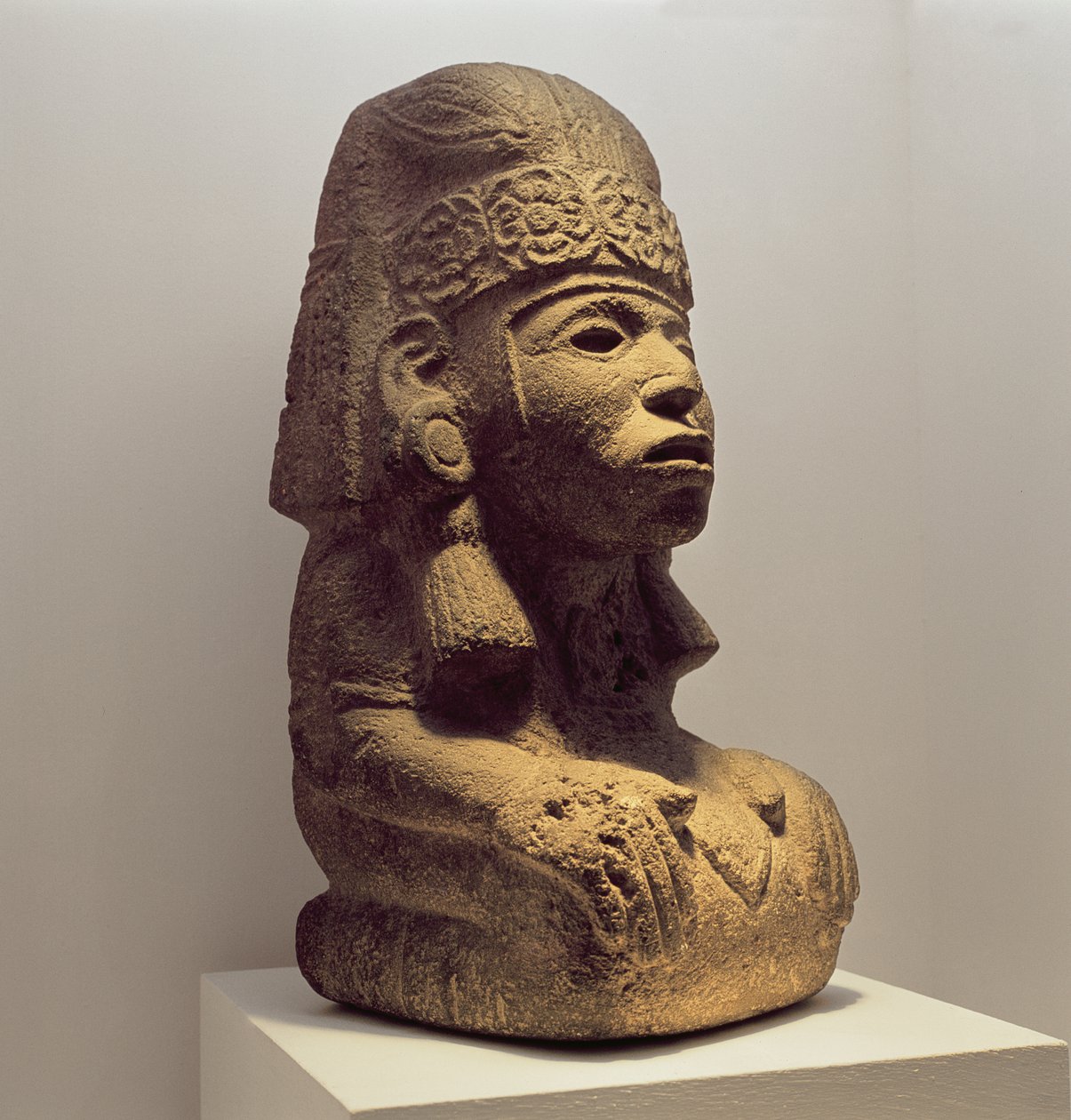 Pot in the form of a kneeling figure by Mayan