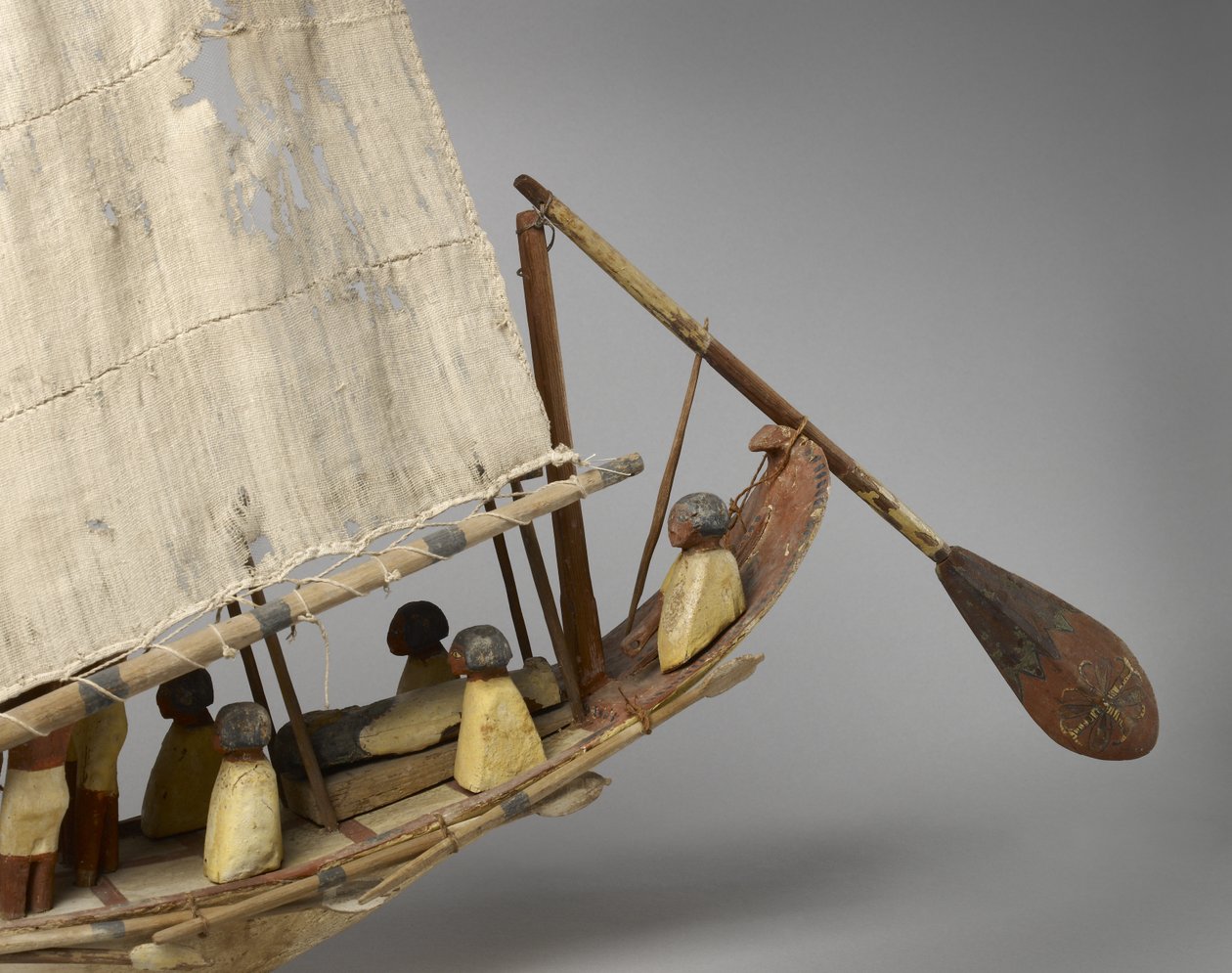 Model Boat with Sail, Oars and 10 Figures, c.1975-1640 BC by Middle Kingdom Egyptian