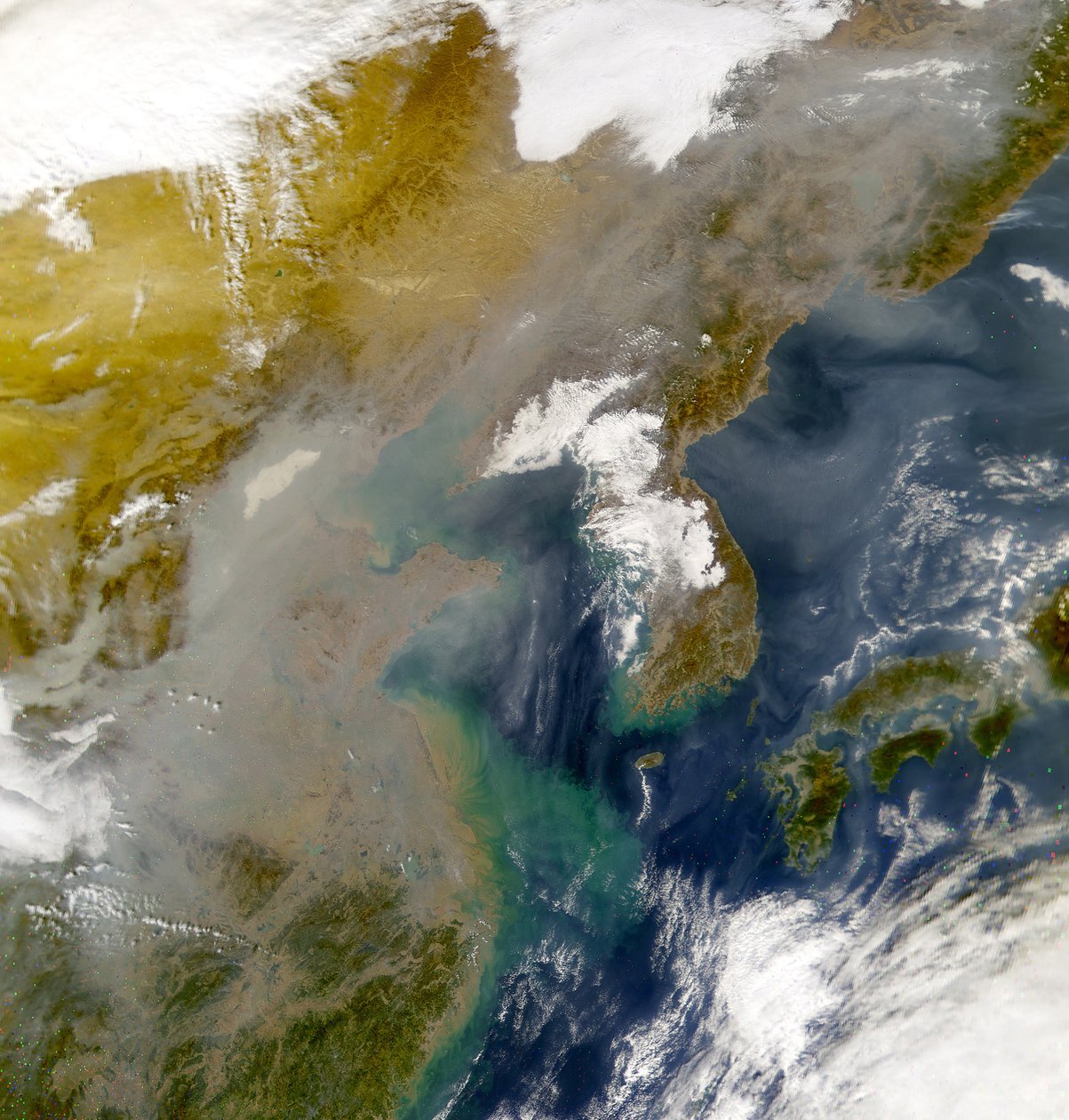 Korea and the Sea of Japan obscured by swirls of pollution by National Aeronautics and Space Administration National Aeronautics and Space Administration