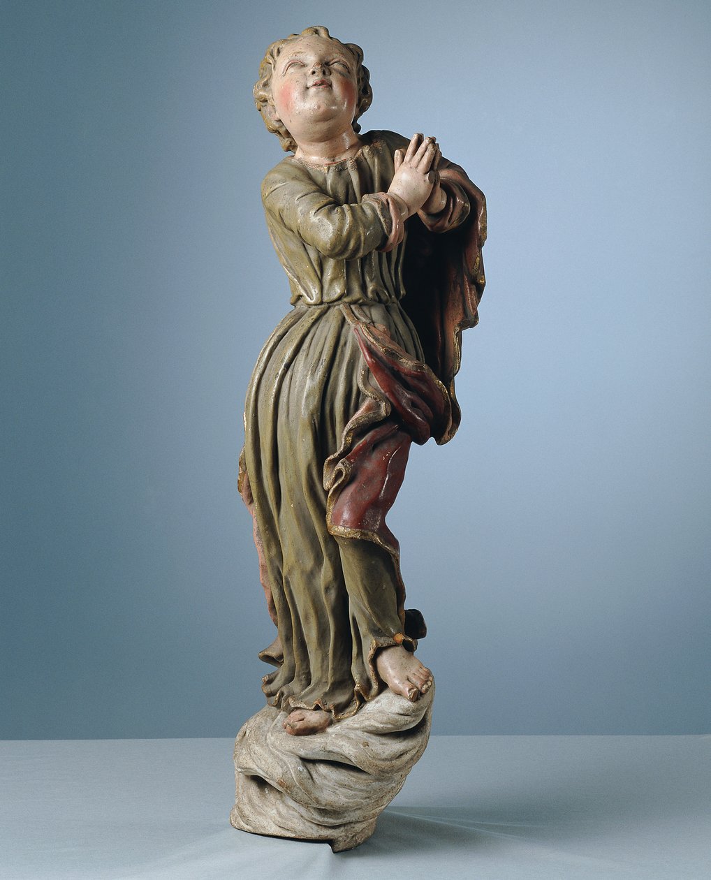 Child in Prayer, Floating on Clouds by Leopold Blonder