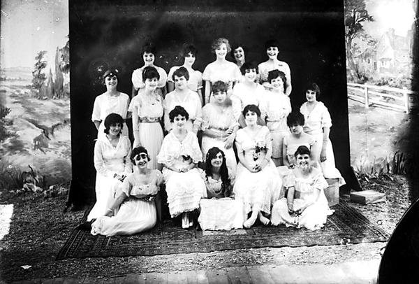 Women on a carpet by Photographer American