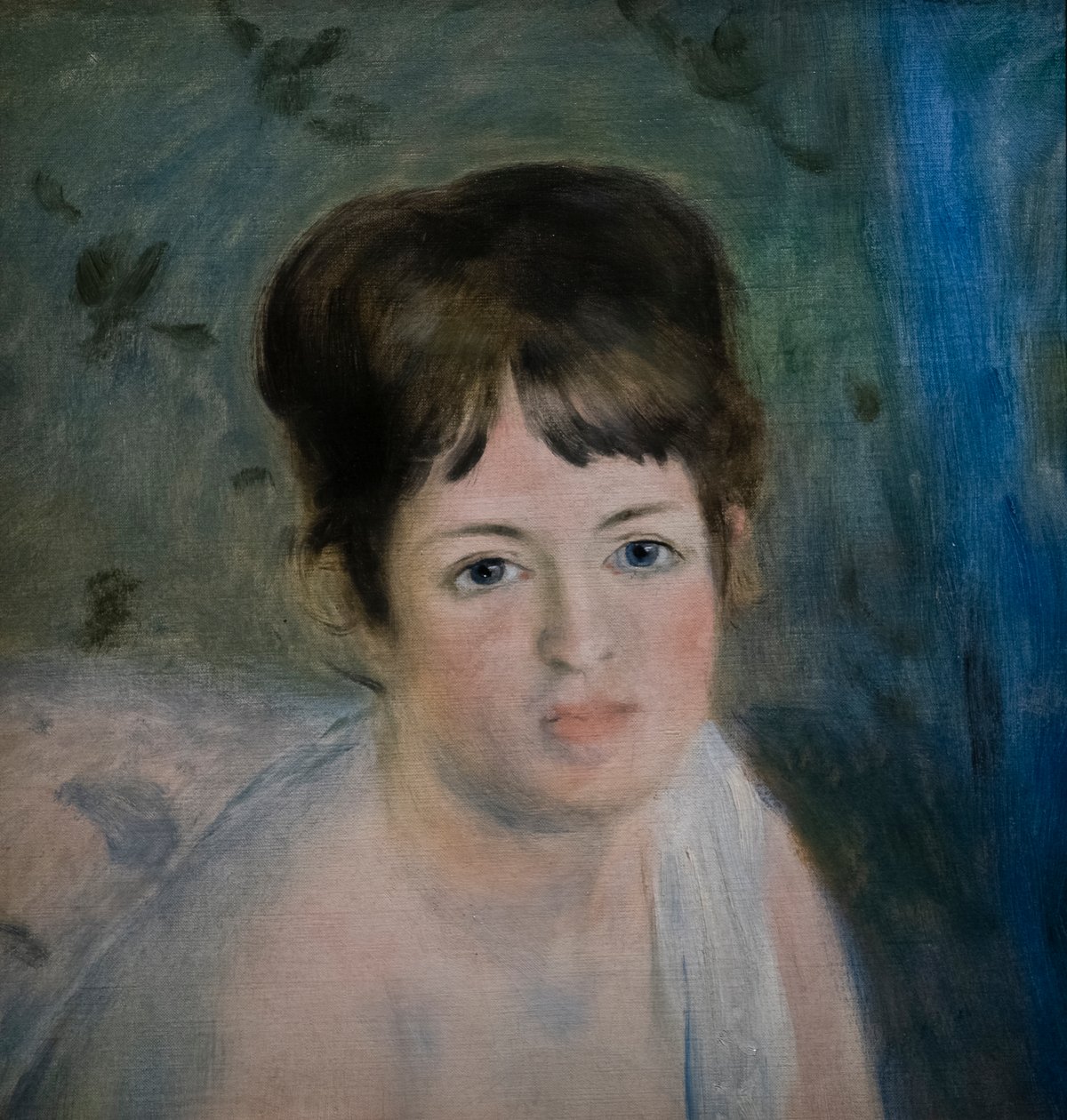 Head of a Woman by Pierre Auguste Renoir