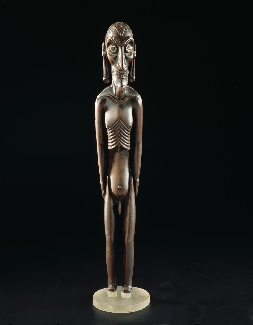 Wooden figure carved in the shape of a man, from Easter Island, before 1894 by Polynesian