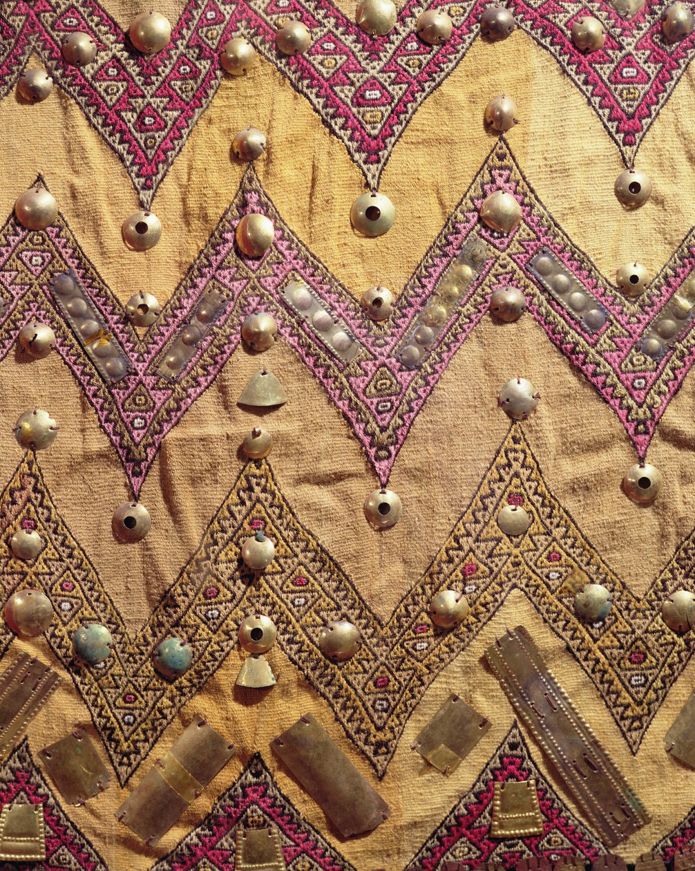 Section of embroidered fabric with gold plaques, from Chancay, Peru by Pre Columbian