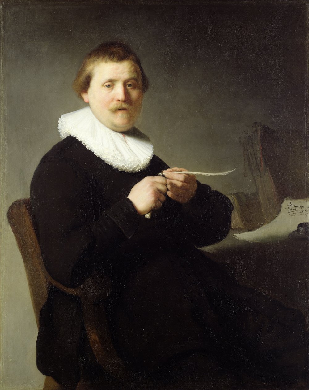 Man Sharpening a Quill by Rembrandt van Rijn