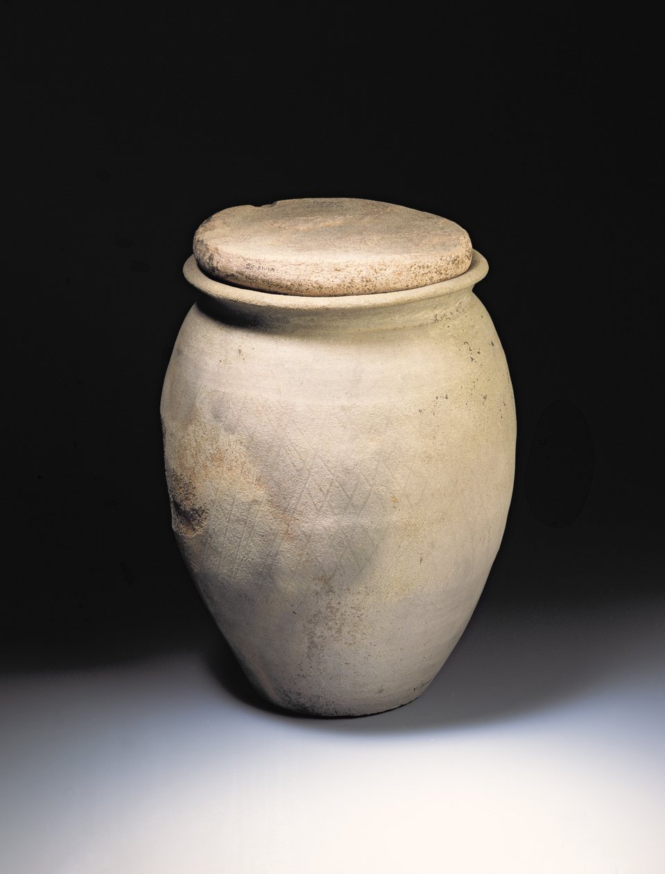 Cremation urn with lattice work pattern, from the Roman site at Newstead, Melrose by Roman