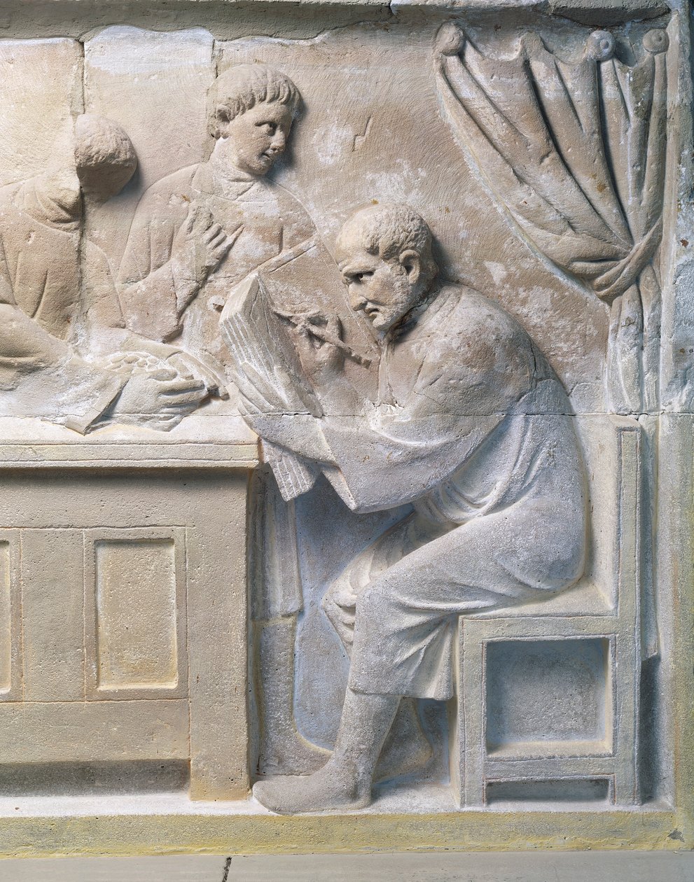 Relief from mausoleum depicting tax collector by Roman