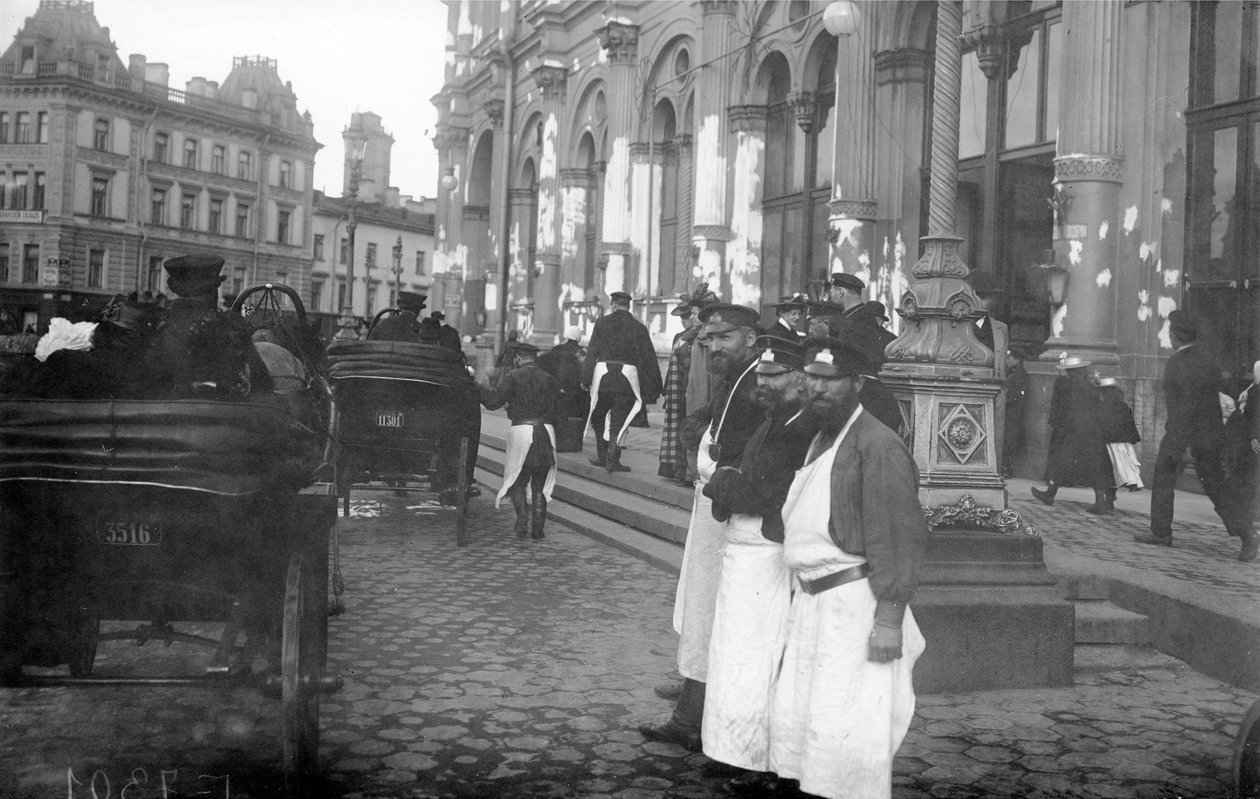 Porters and passengers outside Nicholas Railway Station, Nevsky Prospekt, St Petersburg, 1913 by Russian Photographer