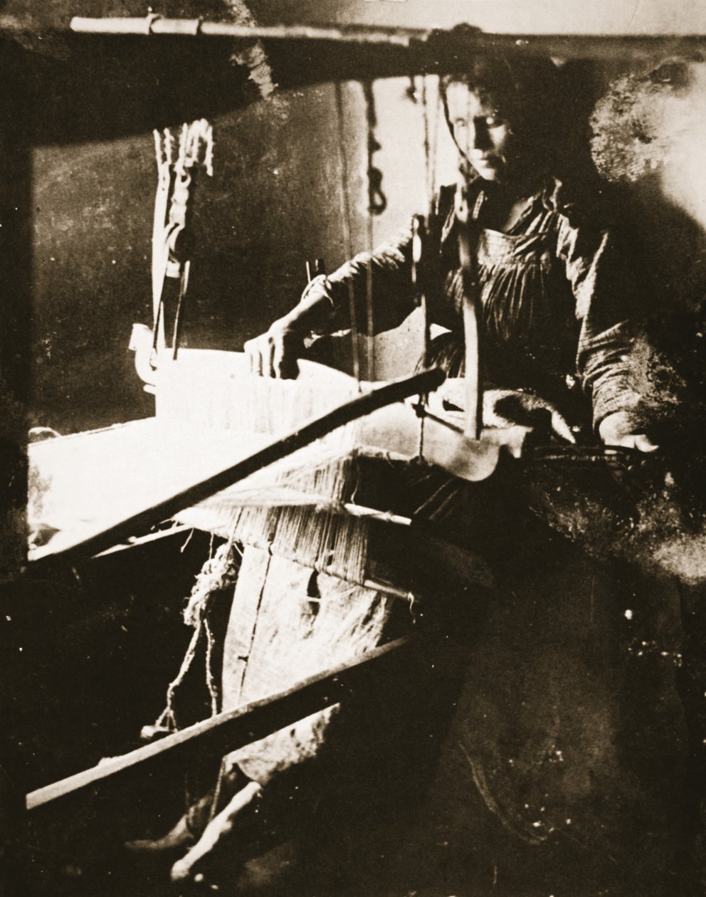 Woman at the loom, Middle Volga, c.1885 by Russian Photographer