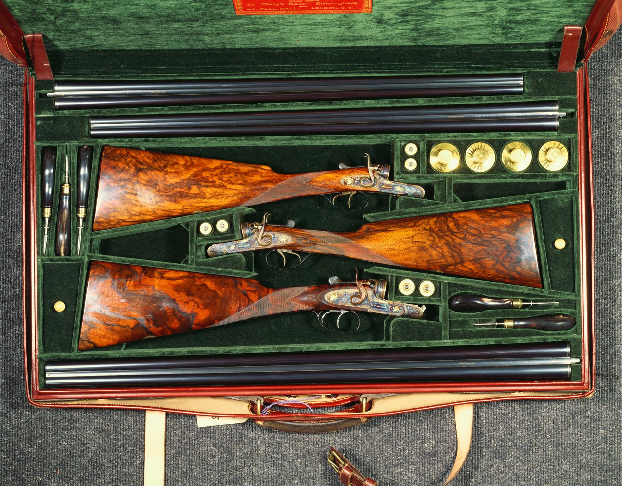 A set of three hammer guns by School English