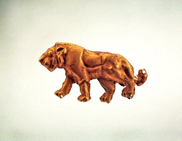 Striding lion, ornament from a funerary canopy, late 3rd millennium BC by Scythian