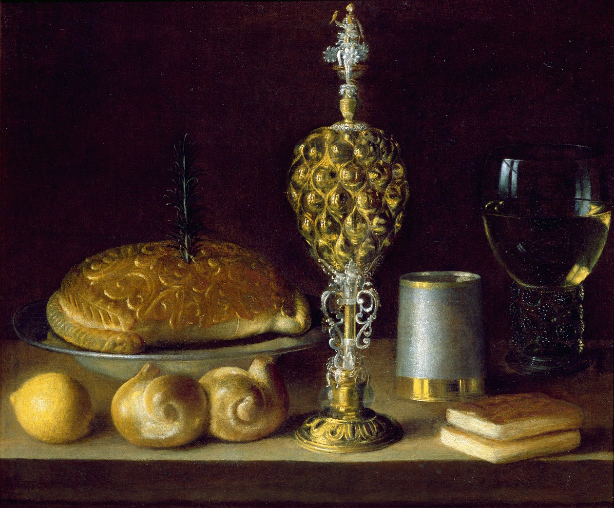 A Still Life of Drinking Vessels, a Pineapple Cup, a Lemon, Bread and Two Small Books by Sebastian Stoskopff