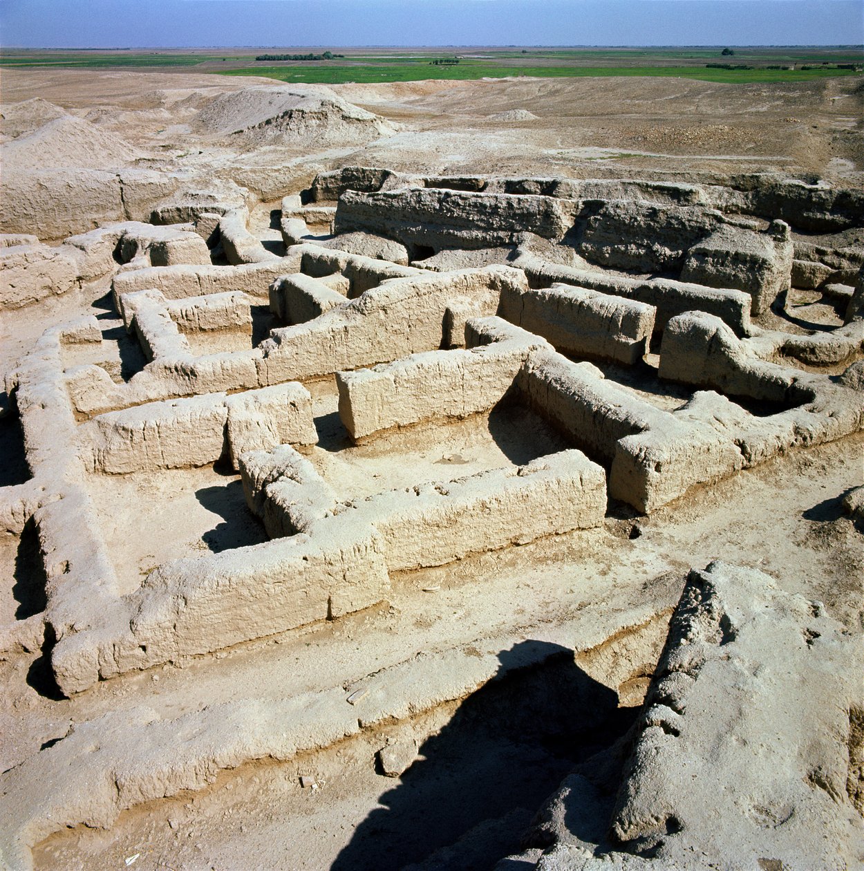 Remains of houses by Syrian