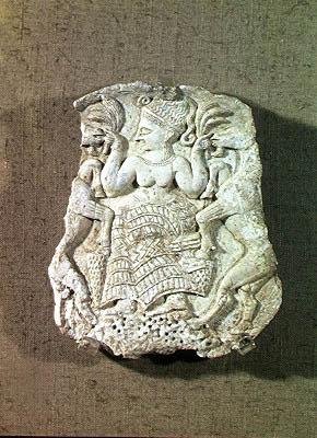 Lid of a pyxis depicting the Mistress of the Animals feeding two wild goats by Syrian Syrian