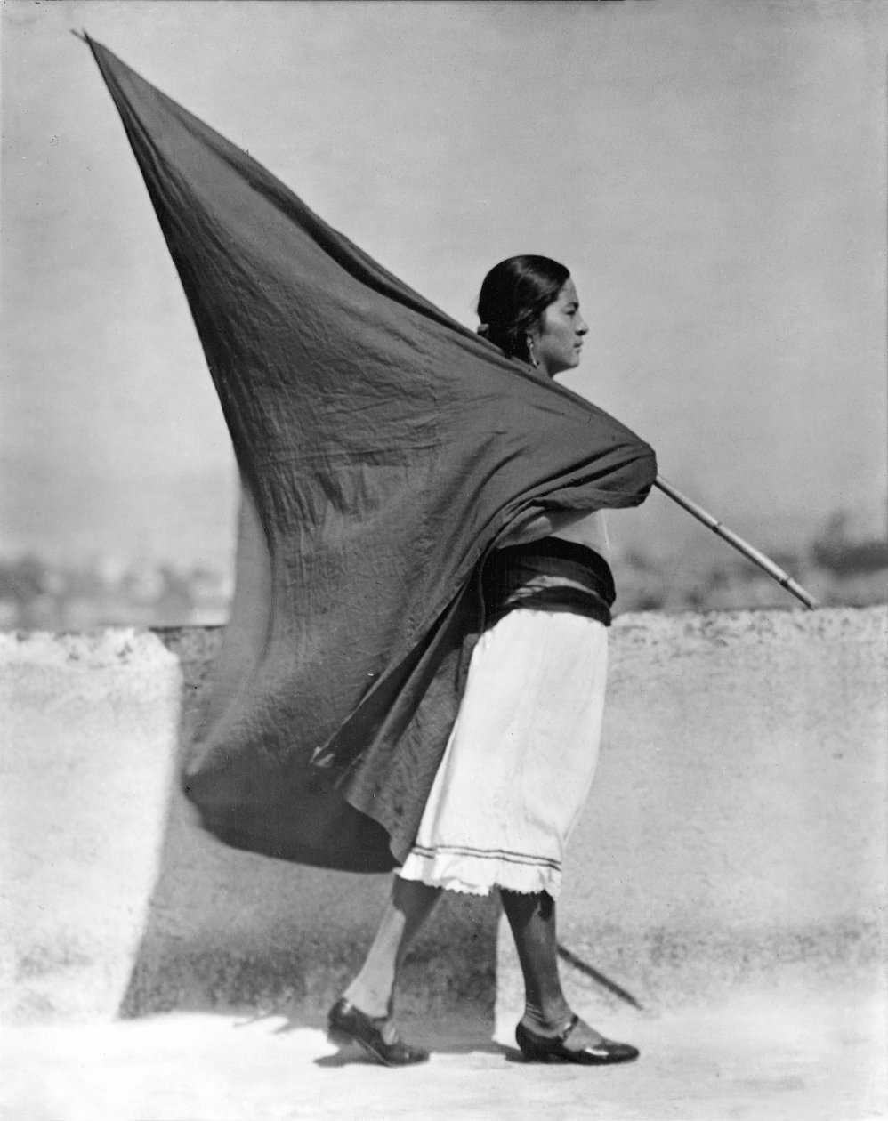 Woman with Flag, Mexico City by Tina Modotti