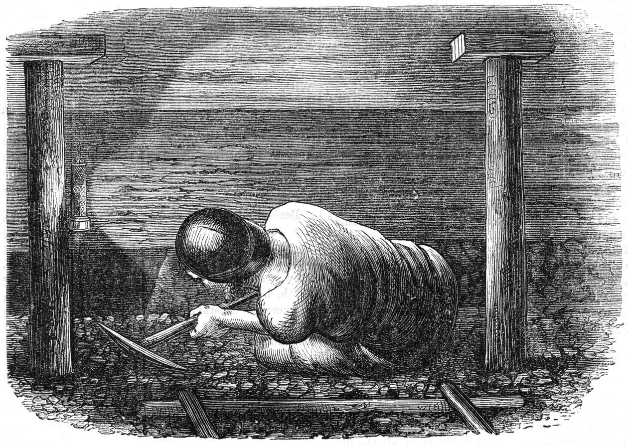 Coal miner working a narrow seam by Unbekannt
