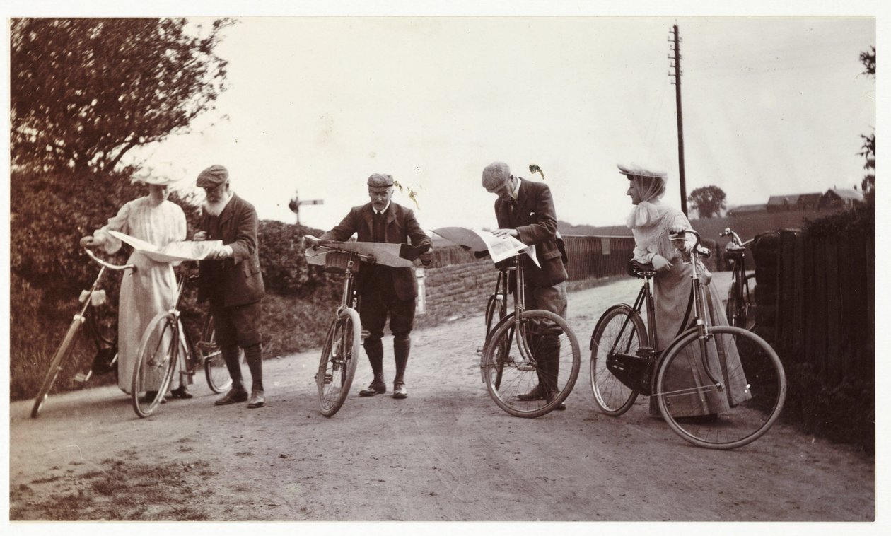 Cyclists looking at maps, c 1900 by Unbekannt
