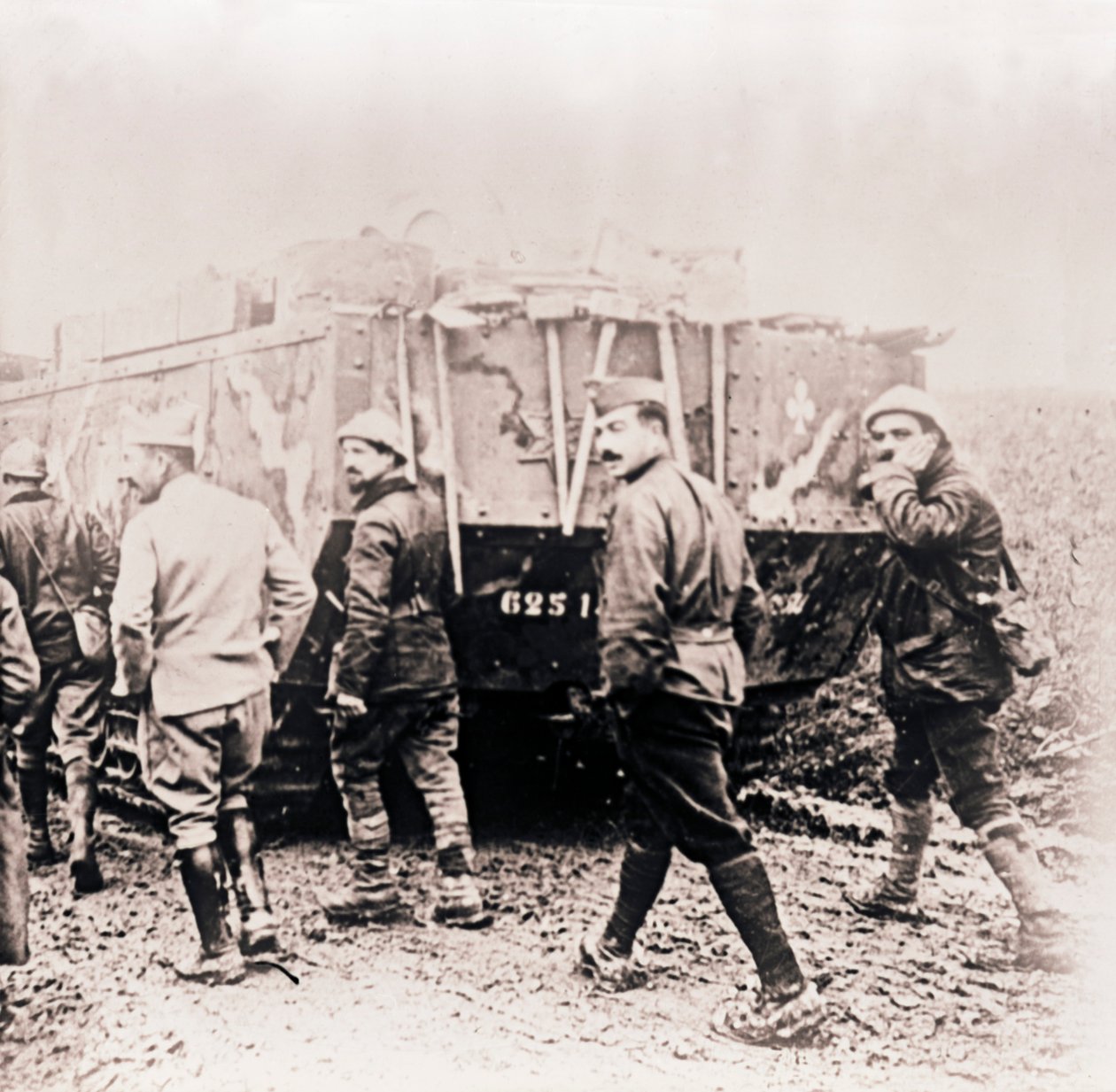 Soldiers Walking Behind Tank, c1914-c1918 by Unbekannt