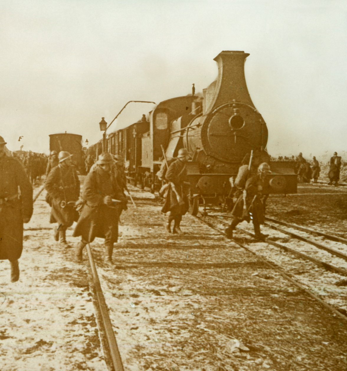 Troops Disembarking from Steam Train by Unbekannt