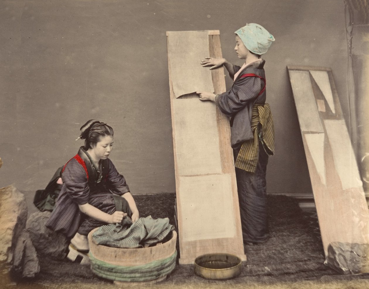 Two Japanese Women Posing with Laundry by Unbekannt