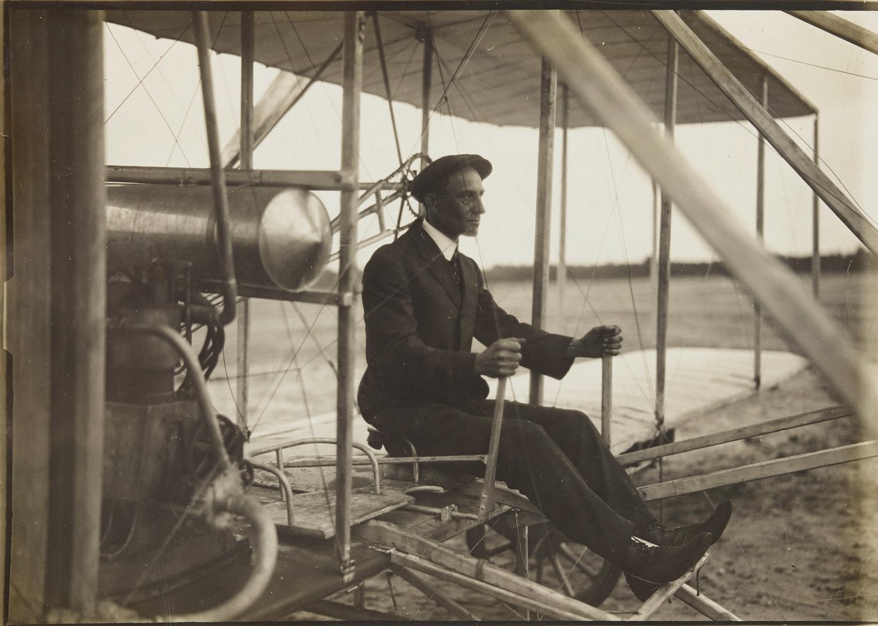 Wilbur Wright in the flyer by Unbekannt
