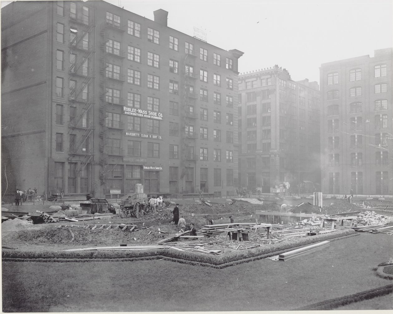 Workers Installing a Fountain in Lucas Garden at Fourteenth and Locust Streets by Unknown