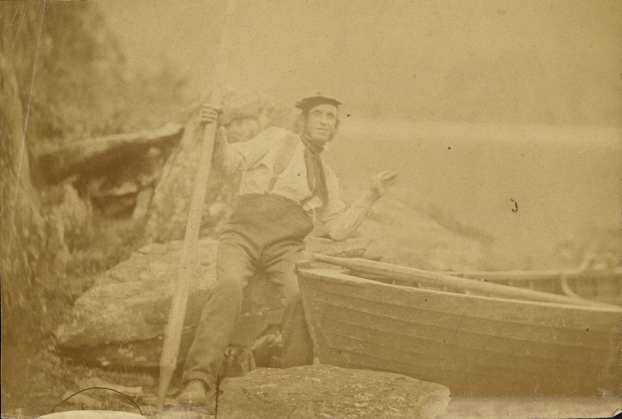 Man Posing Beside Rowboat by Unknown artist/maker