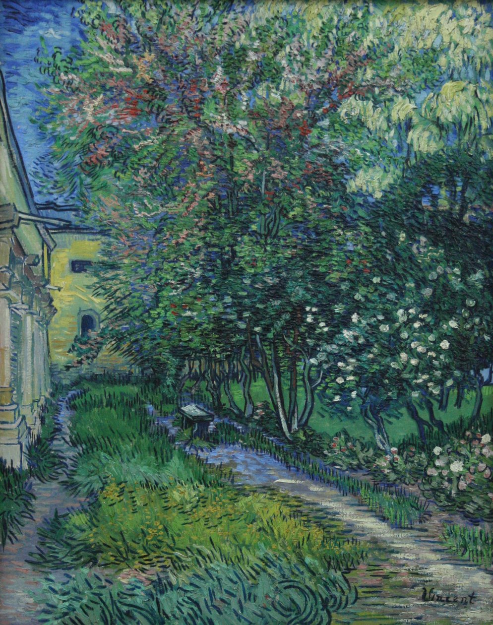 The Garden of the Asylum in Saint-Rémy by Vincent van Gogh