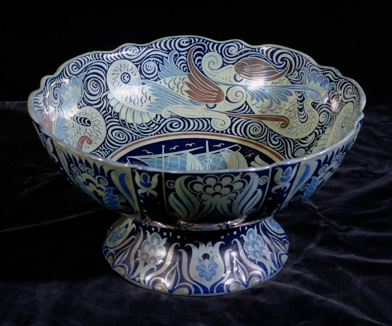 Punch Bowl with a Ship in the Centre and a Frieze of Fish and Waves around the Rim, Painted by Fred Passenger by William de Morgan