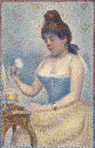 Young Woman Powdering Herself
