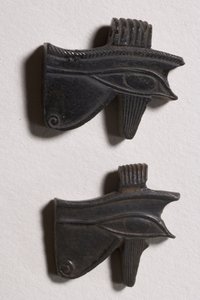 Two wedjat eye amulets