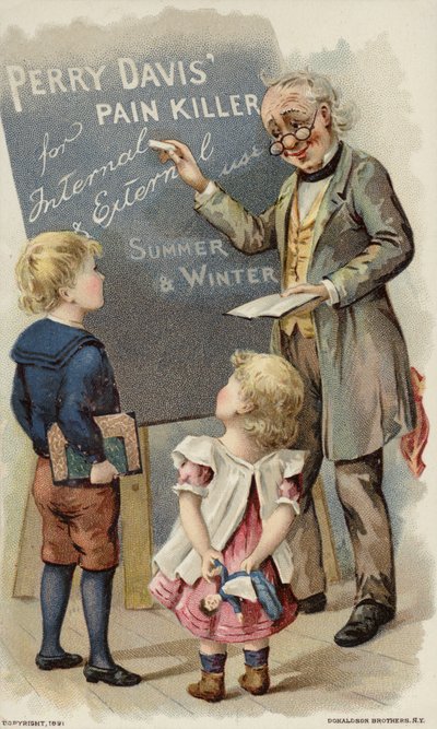 Children Looking at Blackboard with Teacher by American School