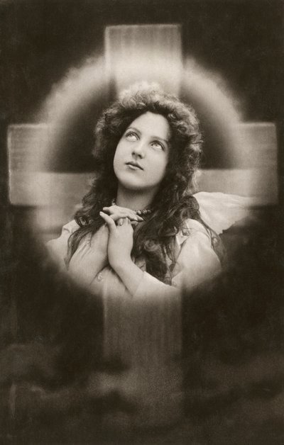 Devout Woman Praying Before a Cross by American School
