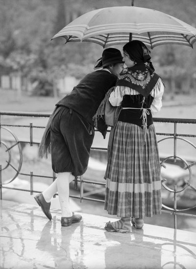 Young couple with umbrella, Italy by Bernard F. Rogers