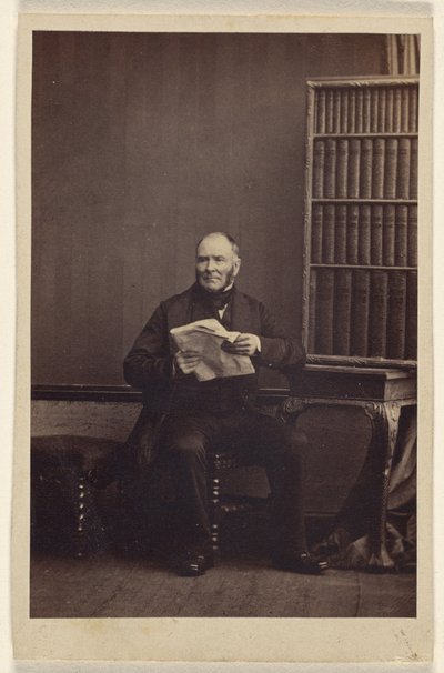 Unidentified Man Seated, Holding a Newspaper by Camille Silvy