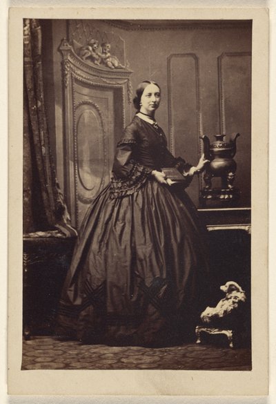 Unidentified woman holding a book, standing by Camille Silvy