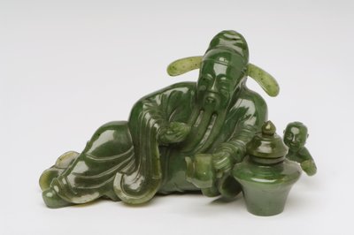 Recumbent Chinese scholar figure by Chinese School