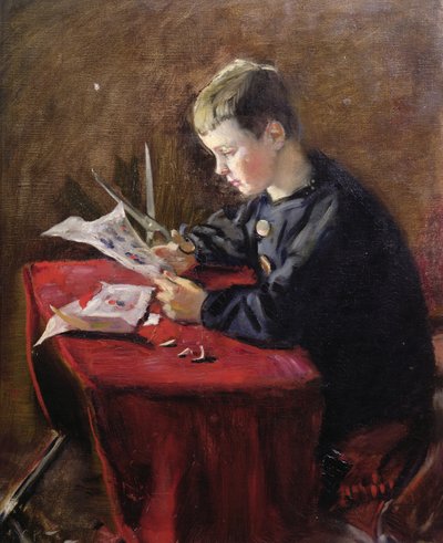 Boy cutting Christmas decorations by Christian Krohg
