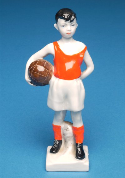 Danish boy holding a football (ceramic) by Danish School