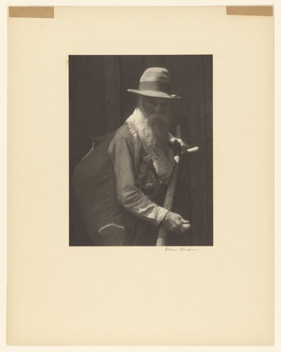 Farmer With Scythe by Doris Ulmann