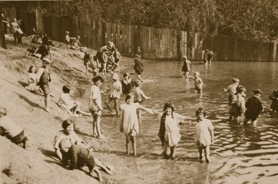 Children playing in Hampstead pond by English Photographer