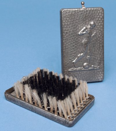 Folding hairbrush with a footballer design by English School