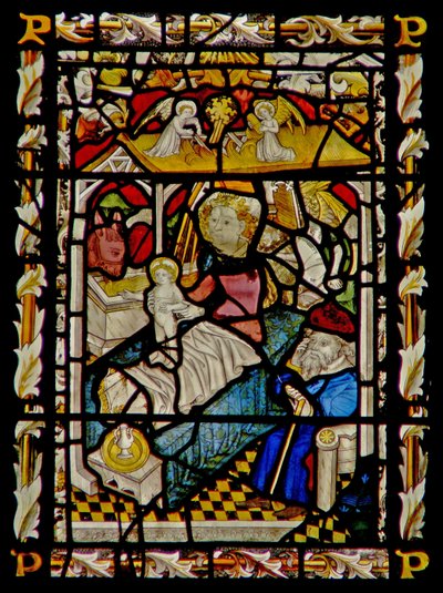 The east window depicting the Nativity by English School