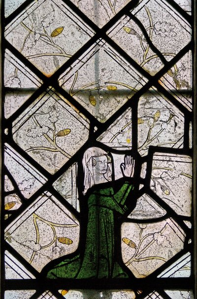 Window depicting a female donor by English School