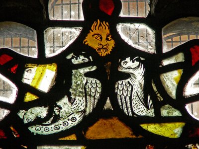 Window depicting grotesques by English School