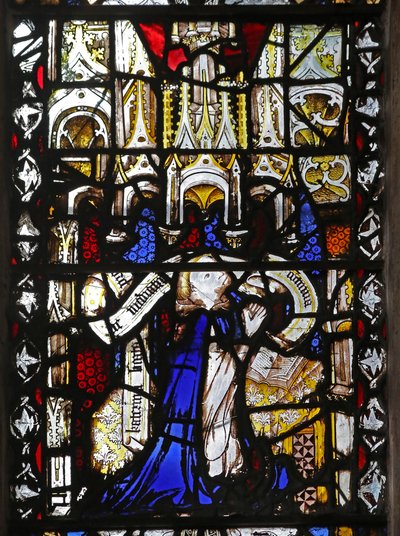 Window n4 depicting a cleric with scroll by English School