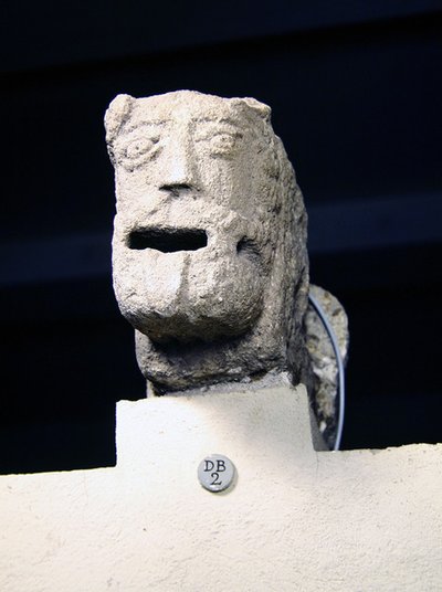 Gargoyle with tongue hanging out by French School