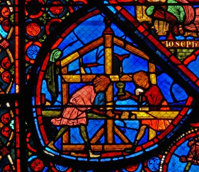 Window w24 depicting donors - carpenters by French School
