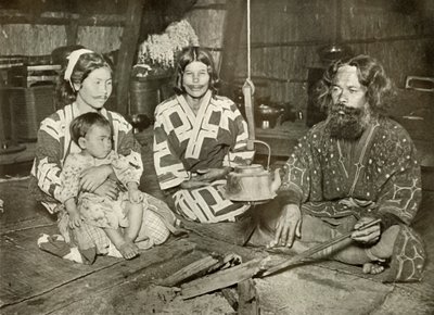 Ainu Man and Women at Home by Herbert Ponting