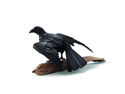 An iron articulated sculpture of a crow by Japanese School